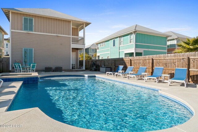 view of swimming pool featuring a patio area