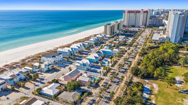 bird's eye view with a view of the beach and a water view