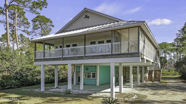 rear view of house with a patio area