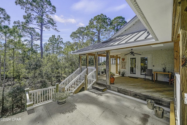 view of patio / terrace with french doors, a deck, and ceiling fan