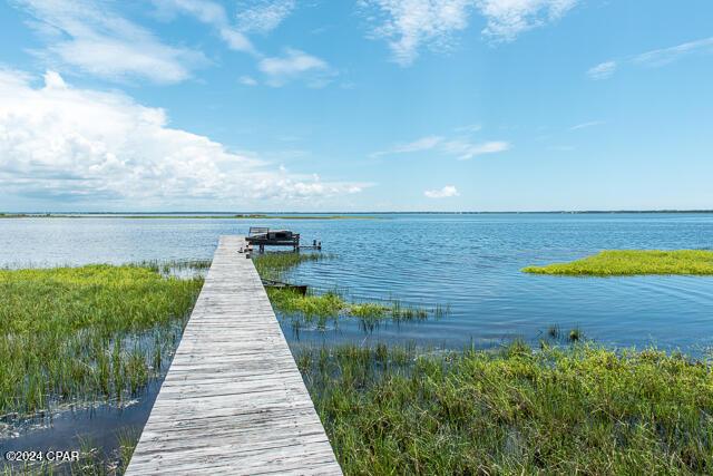 view of dock with a water view