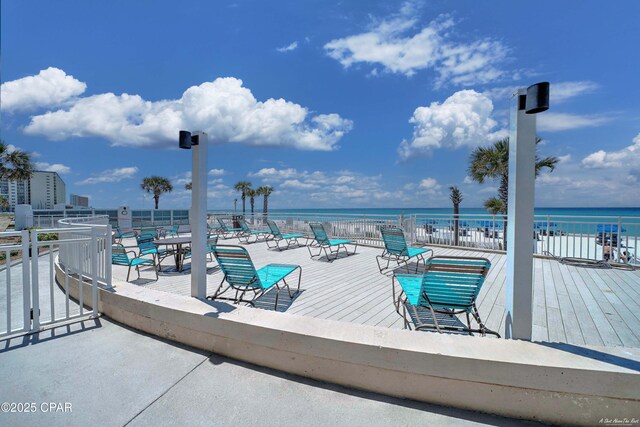 6201 Thomas Dr Unit 1405, Panama City, FL 32408 - wooden terrace with a water view