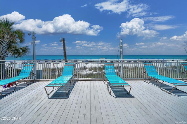 deck featuring a water view