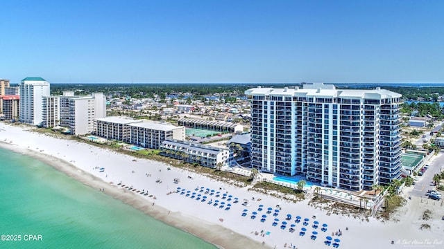 aerial view featuring a view of city, a water view, and a view of the beach