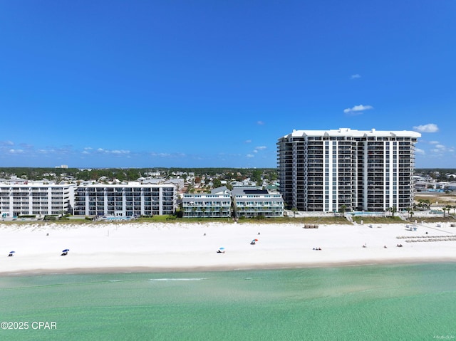 aerial view with a view of the beach and a water view