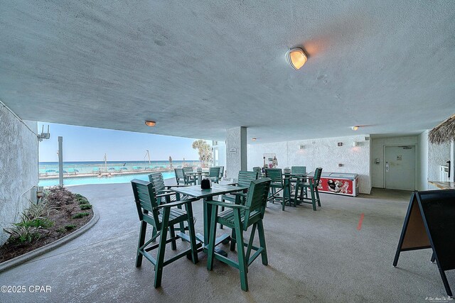 6201 Thomas Dr Unit 1405, Panama City, FL 32408 - view of patio / terrace with a water view