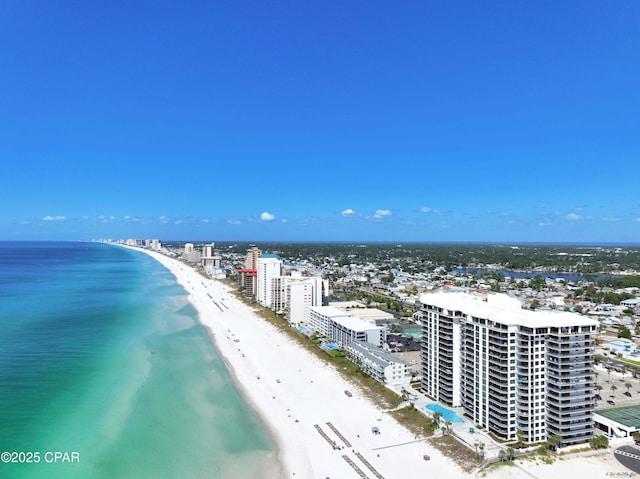 bird's eye view with a view of the beach, a city view, and a water view