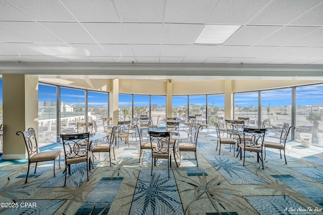 6201 Thomas Dr Unit 1405, Panama City, FL 32408 - dining room featuring a drop ceiling
