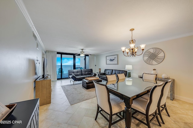 dining room with baseboards, visible vents, floor to ceiling windows, and crown molding