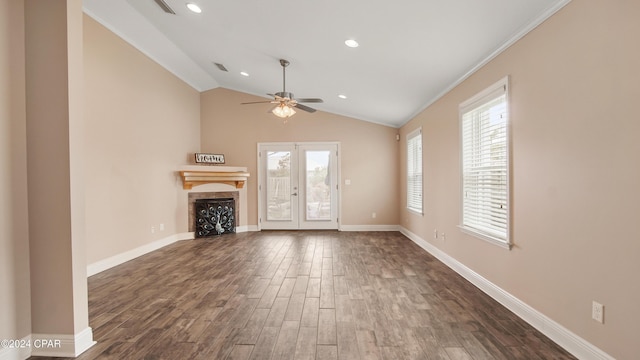 unfurnished living room featuring ceiling fan, lofted ceiling, dark wood-type flooring, and ornamental molding