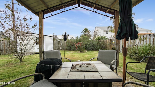 view of patio featuring a gazebo