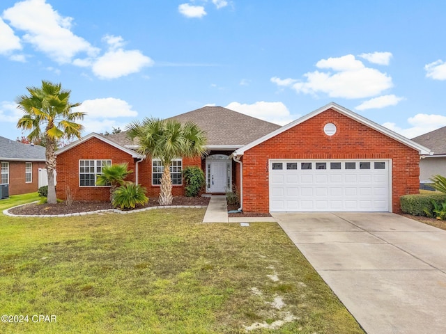 single story home with a front yard, a garage, and central air condition unit