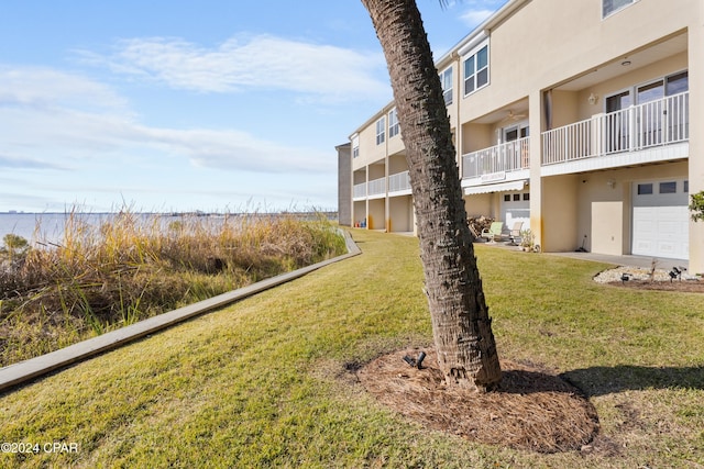 surrounding community featuring a yard