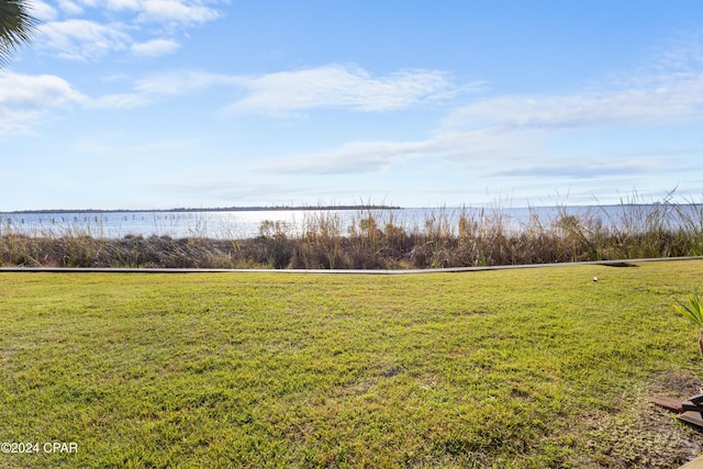 view of yard with a water view