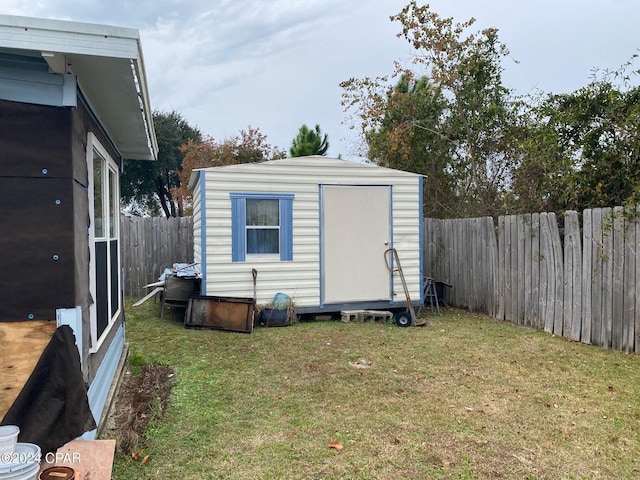 view of outdoor structure featuring a yard