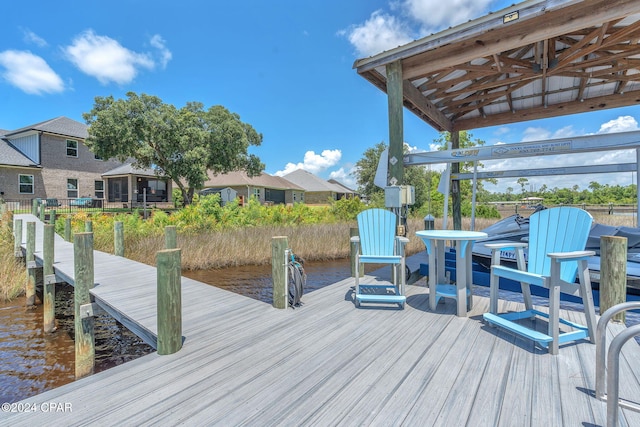 dock area with a water view