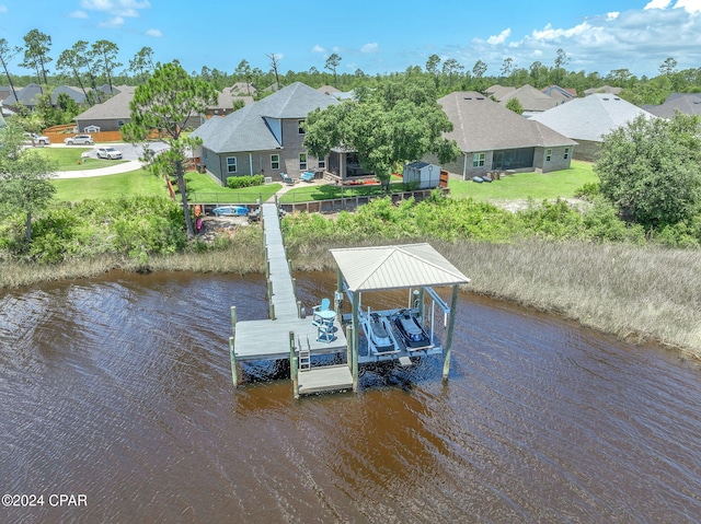 dock area with a water view