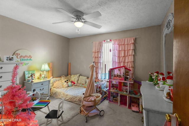 7707 Shadow Bay Dr, Panama City, FL 32404 - carpeted bedroom featuring ceiling fan and a textured ceiling