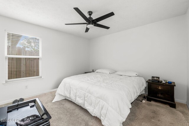 bedroom with carpet and ceiling fan