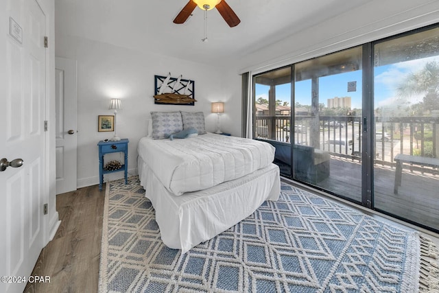 bedroom with access to exterior, ceiling fan, and hardwood / wood-style flooring