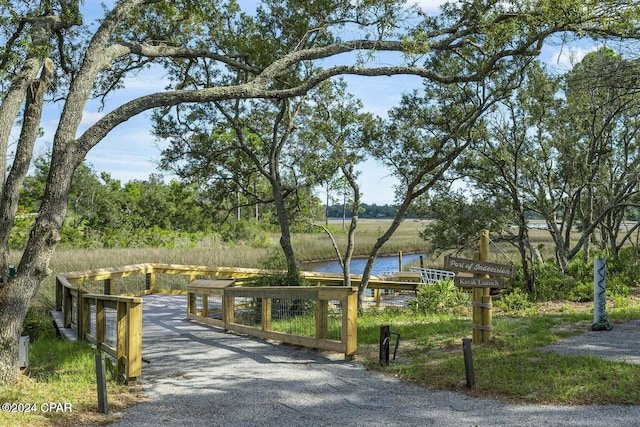 view of home's community featuring a water view