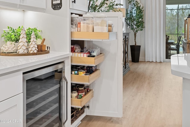 pantry featuring wine cooler