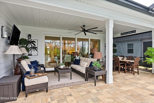 view of patio / terrace featuring ceiling fan and an outdoor living space