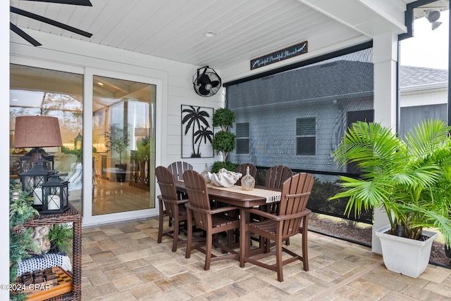 view of patio featuring ceiling fan