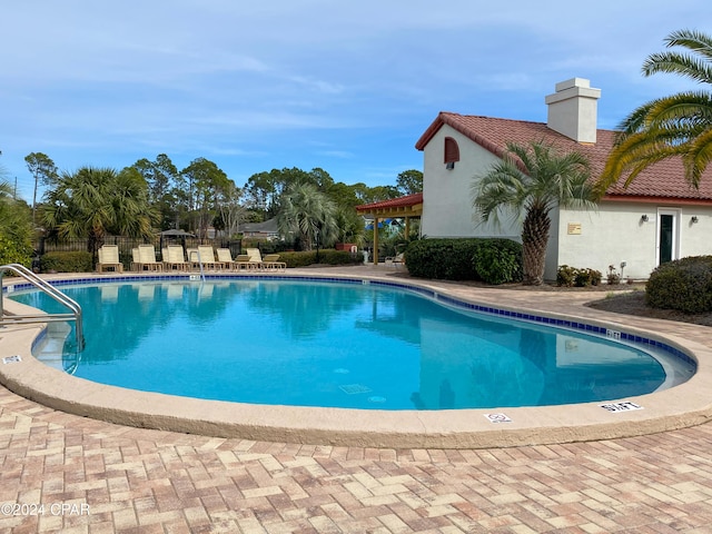 view of pool with a patio area