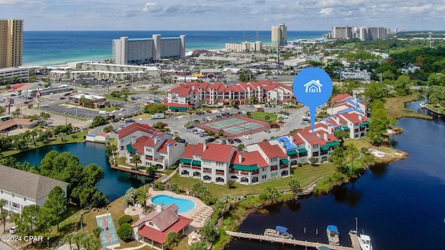 birds eye view of property featuring a water view