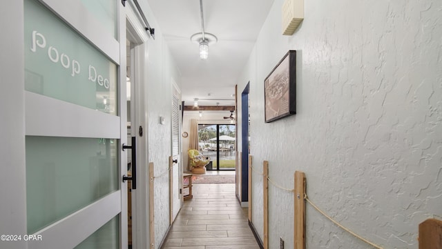 hallway featuring hardwood / wood-style flooring