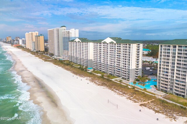 aerial view featuring a view of the beach and a water view