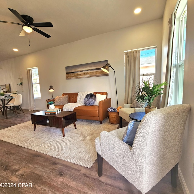 living room with ceiling fan, a healthy amount of sunlight, and hardwood / wood-style flooring