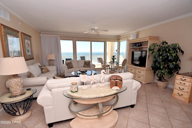 living area with ceiling fan, ornamental molding, light tile patterned flooring, and visible vents