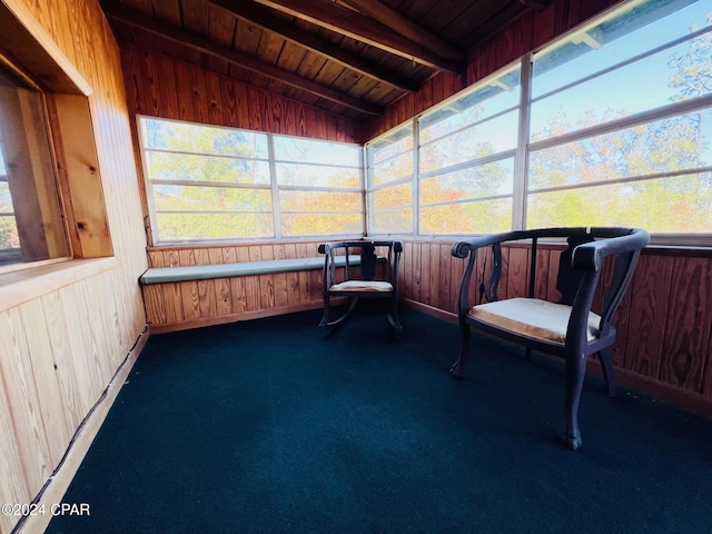 sunroom / solarium with lofted ceiling with beams and wood ceiling