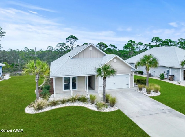 single story home featuring a garage and a front lawn