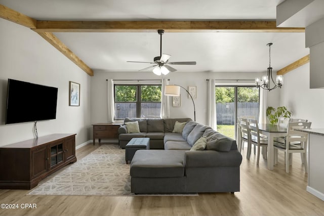 living room featuring a healthy amount of sunlight and light hardwood / wood-style floors