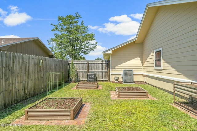 view of yard featuring central AC unit