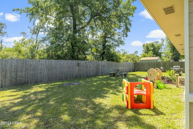 view of yard featuring a playground