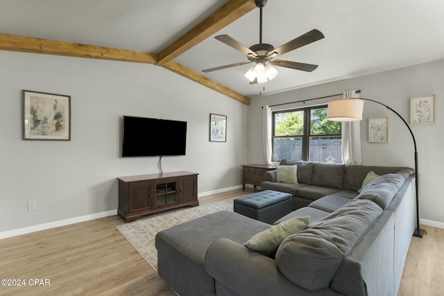 living room featuring light wood-type flooring, lofted ceiling with beams, and ceiling fan