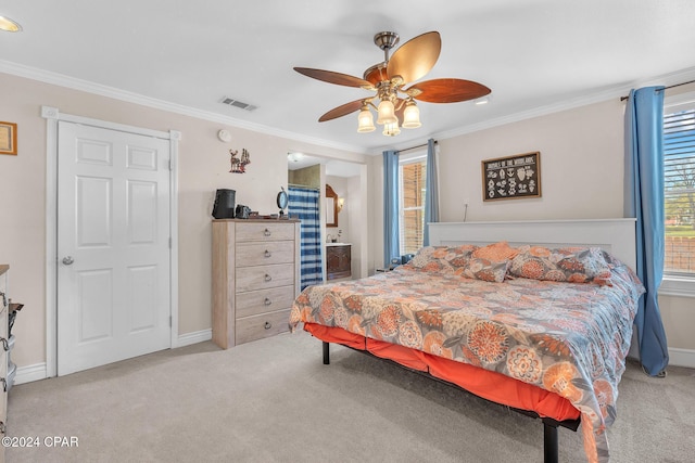 carpeted bedroom with ceiling fan, ornamental molding, ensuite bathroom, and multiple windows