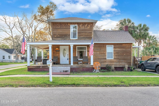 748 3rd St, Chipley, FL 32428 - view of front of property with a porch and roof with shingles