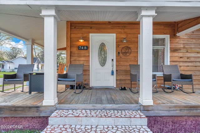 748 3rd St, Chipley, FL 32428 - view of exterior entry featuring covered porch