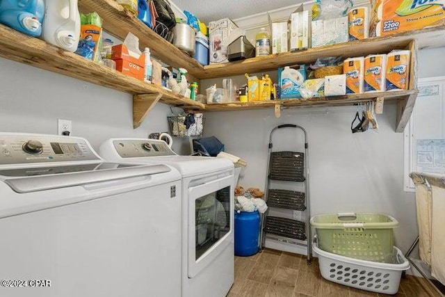 washroom featuring independent washer and dryer