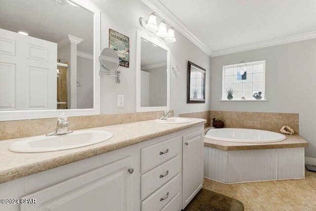 bathroom with vanity, a bathtub, ornamental molding, and tile patterned flooring