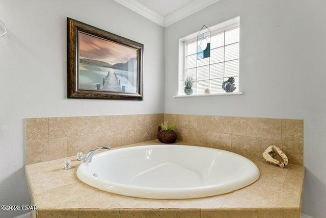 bathroom featuring a relaxing tiled tub and ornamental molding