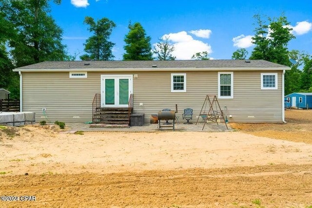 back of house featuring a patio