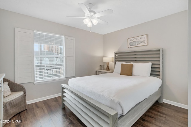 bedroom featuring dark hardwood / wood-style floors and ceiling fan