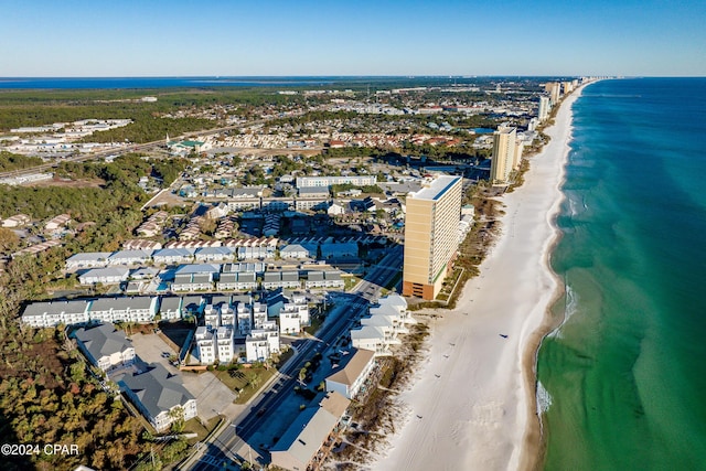 bird's eye view with a view of the beach and a water view