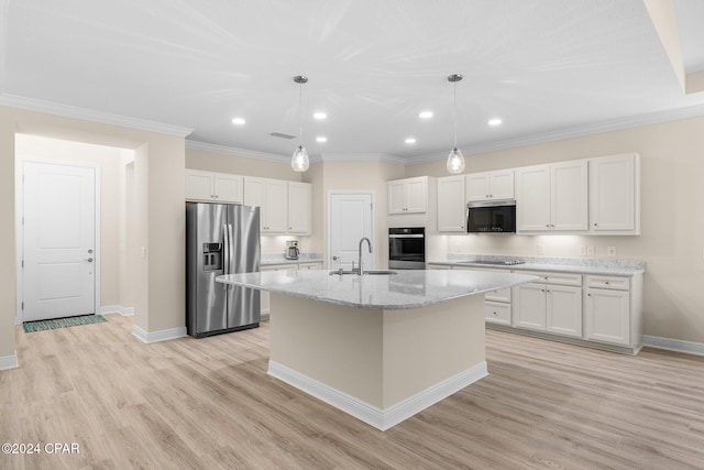 kitchen with light wood-style floors, white cabinetry, appliances with stainless steel finishes, and a sink